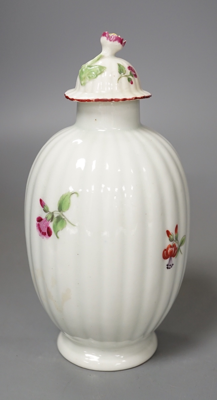 A Worcester tea canister and rare cover painted with flowers on a fluted body c.1770. 16.5cm